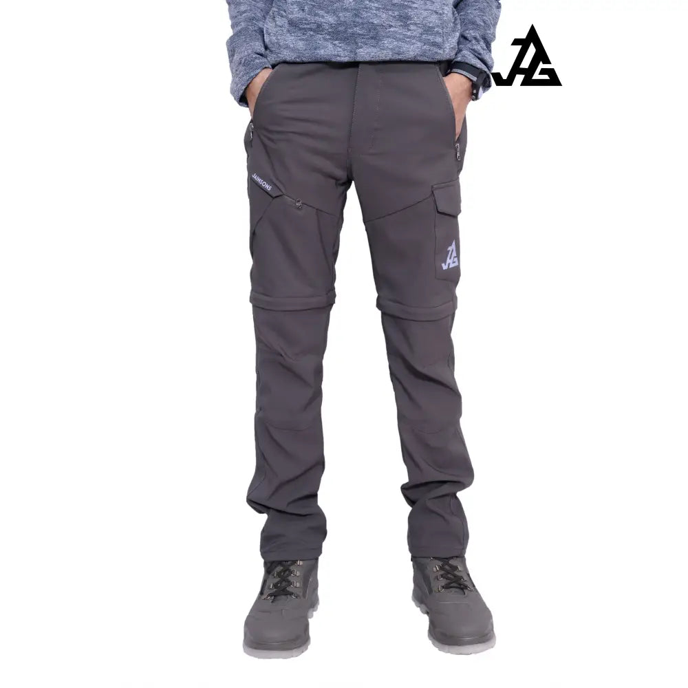 JAG men's Discovery Series convertible trekking and hiking cargo pants in gray, with zip-off legs for travel and outdoor adventures.