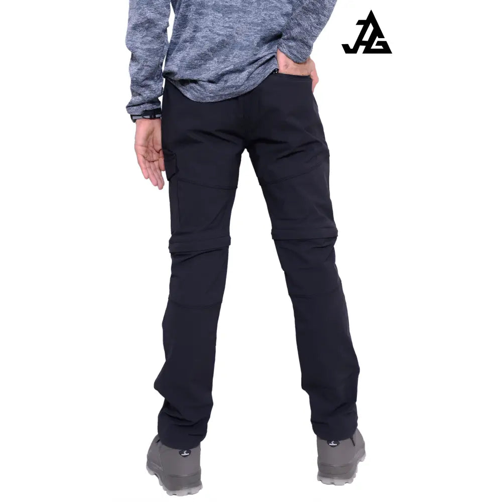 Black JAG Men's Discovery Series convertible trekking and hiking pants with multiple cargo pockets, suitable for travel and outdoor adventures.