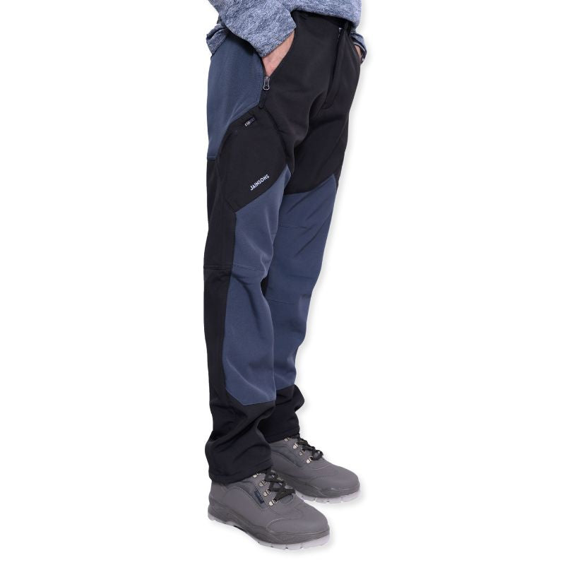 Black JAG men's snow-proof cargo pants with multiple pockets, designed for trekking and hiking in cold weather.