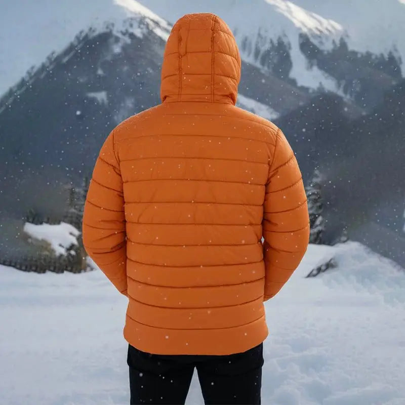 JAG Unisex Shivalik Series ultra-light polyfill jacket with heavy insulation, bright orange color, designed for extreme cold weather.