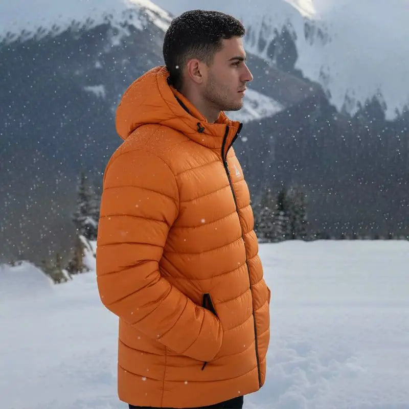 JAG Unisex Shivalik Series ultra-light polyfill jacket with heavy insulation, designed for extreme cold weather, in orange color.