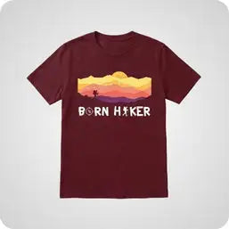 Maroon short-sleeved t-shirt featuring a pixelated sunset landscape with the text ’born hiker’ printed below.