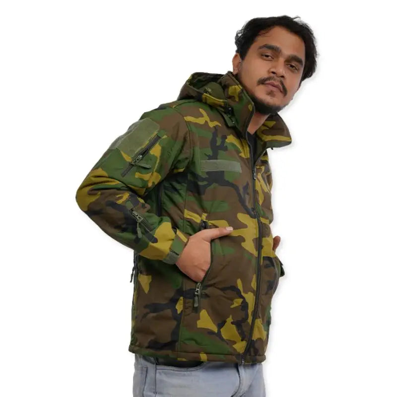 NLTW men's military woodland camouflage softshell jacket with multiple pockets, designed for tactical outdoor wear and rugged outdoor activities.
