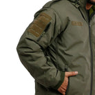 Men’s NLTW tactical softshell jacket with removable inner liner, olive green, durable outdoor jacket with multiple pockets.