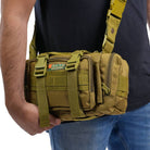 Green NLTW tactical duffel bag with multiple compartments, military-style design, and adjustable waist and sling straps.