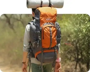 Orange and gray hiking backpack with a rolled sleeping pad strapped to the top.