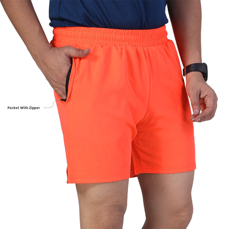 Ruggd Indian men's active running shorts with multiple pockets and liner, in orange, designed for comfort and performance.