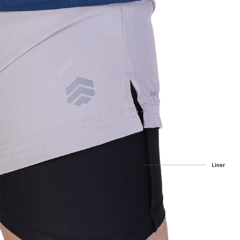 Gray Ruggd Indian men's running shorts with multiple pockets and built-in liner, designed for active and comfortable wear.