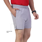 Gray Ruggd Indian men's running shorts with multiple pockets and built-in liner, designed for active sports and outdoor activities.