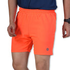 Ruggd Indian men's multiple pocket running shorts with liner, lightweight activewear in orange, designed for running and exercise.