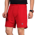 Red Ruggd Indian men's running shorts with multiple pockets and built-in liner, designed for active wear and comfort.