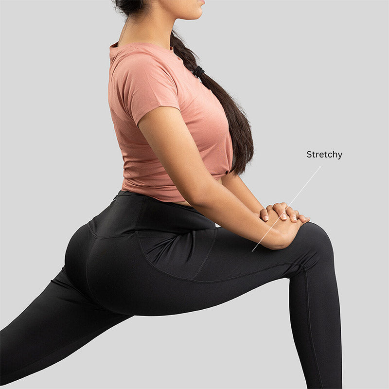 Ruggd Indian women's all-in-one training leggings in black, stretchy fabric, designed for active wear and comfortable workout sessions.