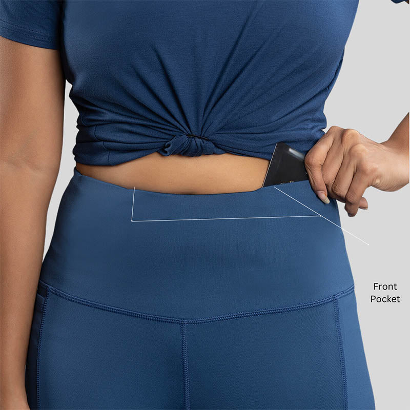 Ruggd Indian women's all-in-one training leggings in black with subtle logo detail, designed for comfortable active wear.