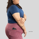 Ruggd Indian women's all-in-one training leggings in orange, fitted with a high waistband and sporty design.