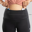 Ruggd Indian women's all-in-one training leggings in black, showing a close-up of the stretchy, form-fitting fabric.