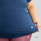 Indian women's odor-resistant bamboo training T-shirt by Ruggd Indian, showing a comfortable, fitted white bamboo fabric tee.