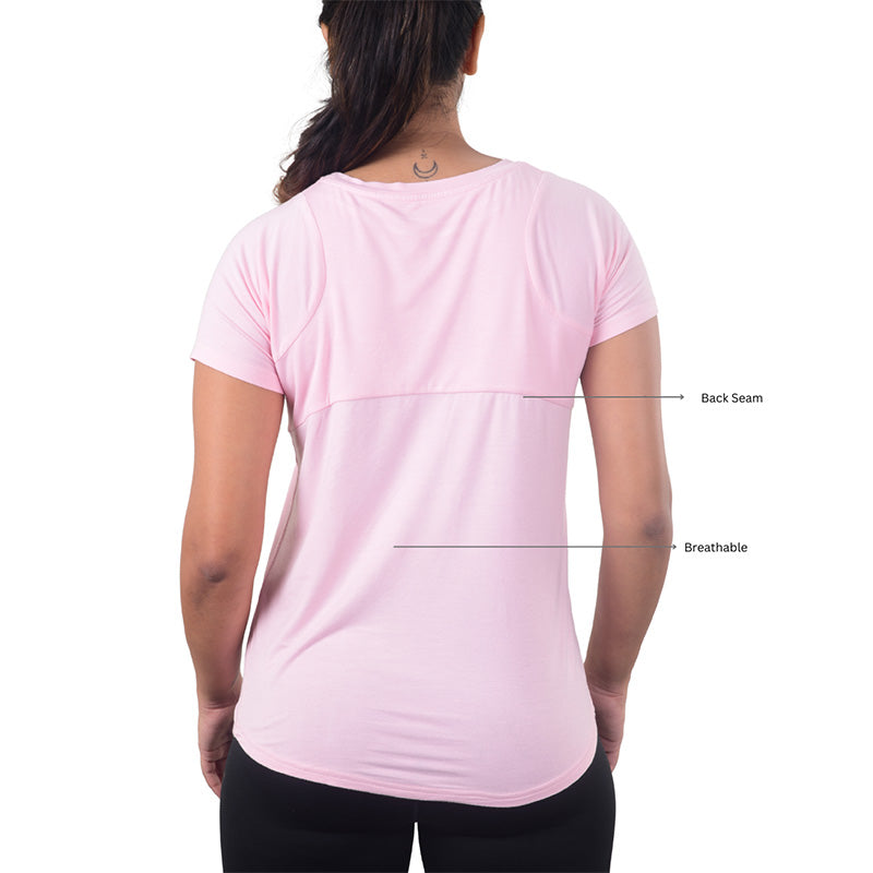 Pink Ruggd Indian women's odor-resistant bamboo training T-shirt, soft fabric, fitted style, shown on a hanger.