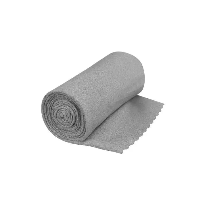 Sea to Summit Airlite Sports XL quick-dry microfibre towel in gray, showing its soft, lightweight fabric and compact design for travel.