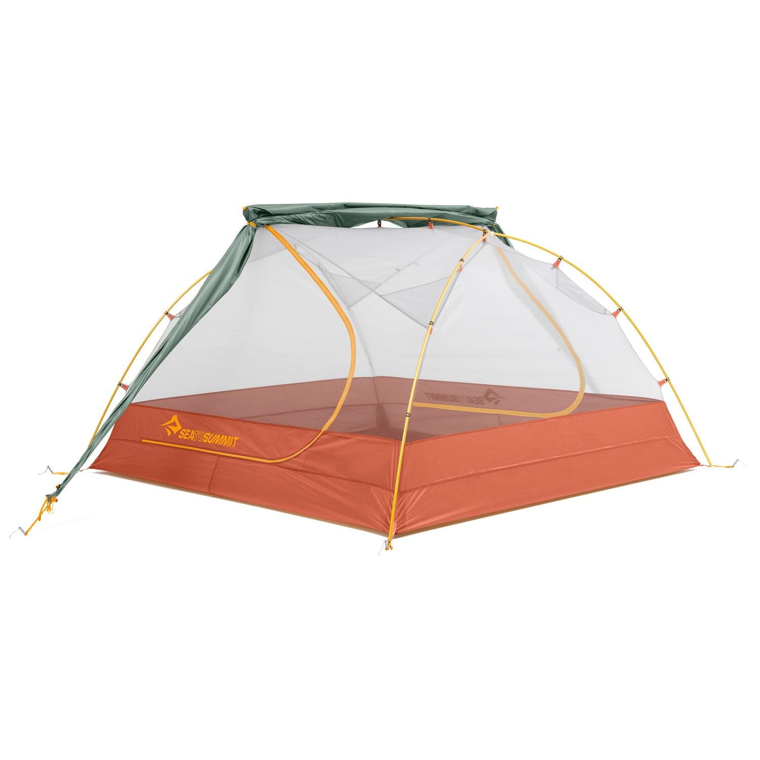 Sea to Summit Ikos TR3 three-person tent set up outdoors with gray fabric and mesh windows, ideal for camping adventures.