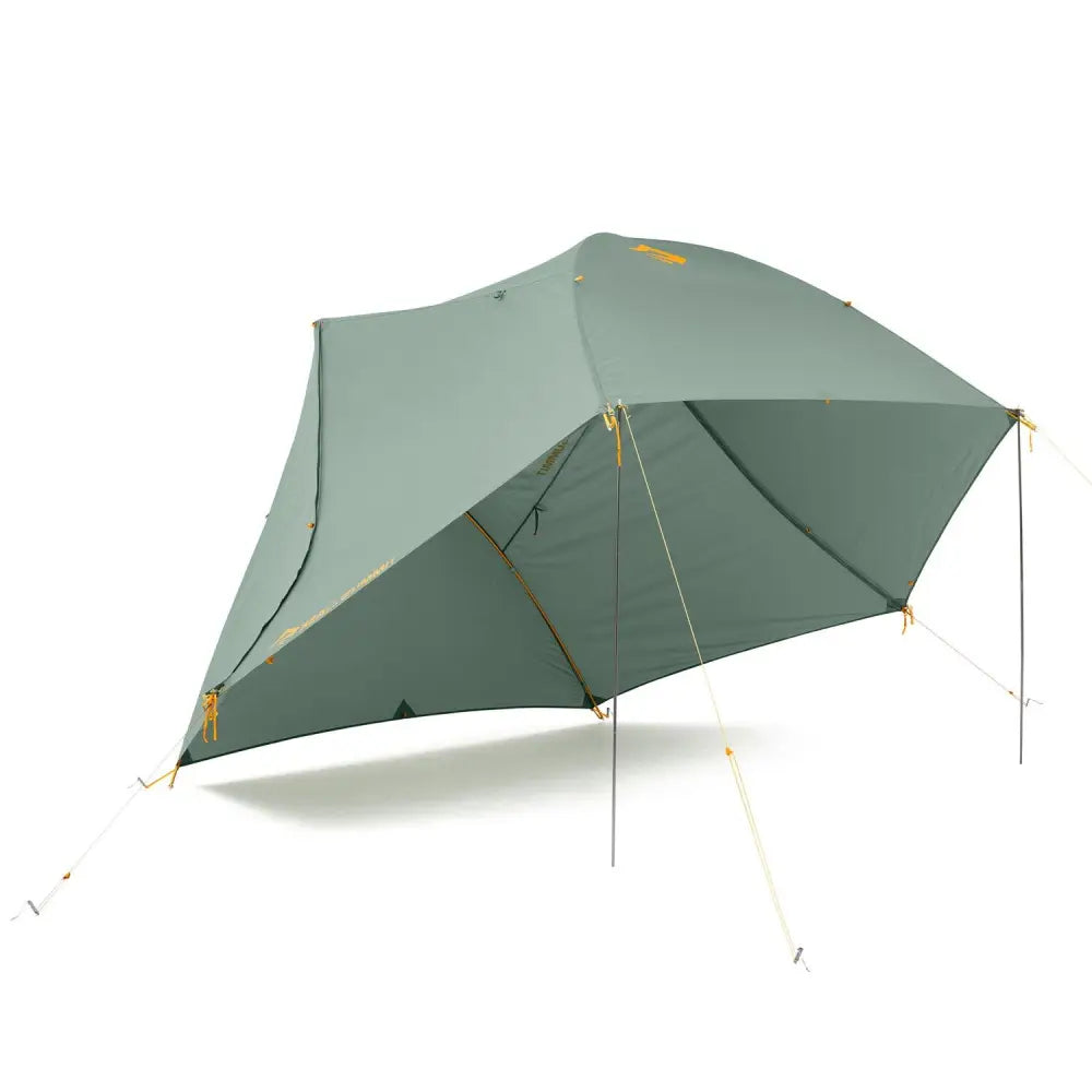 Three-person Sea to Summit Ikos TR3 tent set up outdoors, showcasing its lightweight design and durable fabric in a natural environment.