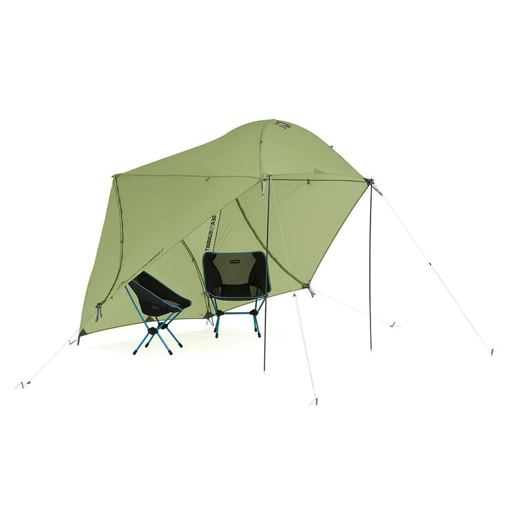 Sea to Summit Telos TR2 Plus two-person freestanding tent set up outdoors with rainfly and mesh walls in green.