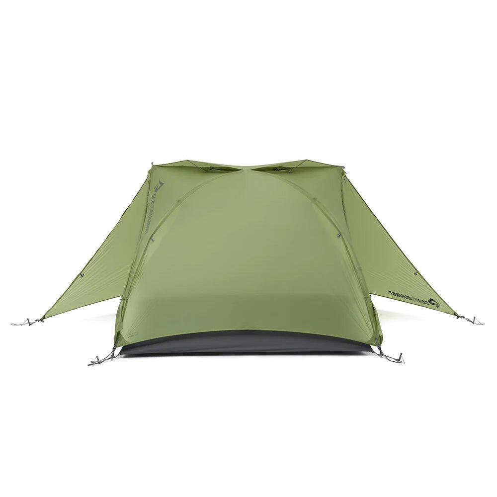 Sea to Summit Telos TR2 Plus two-person freestanding tent set up outdoors, showing green fabric and rainfly for 3+ season camping.