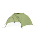 Green Sea to Summit Telos TR2 Plus two-person freestanding tent set up outdoors with rainfly and mesh panels for ventilation.