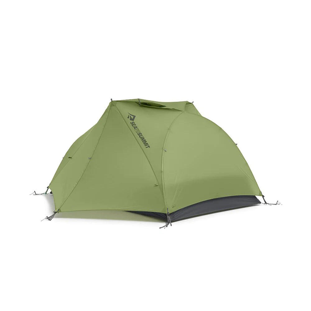 Sea to Summit Telos TR2 Plus two-person freestanding tent set up outdoors, green fabric, suitable for 3+ season camping.