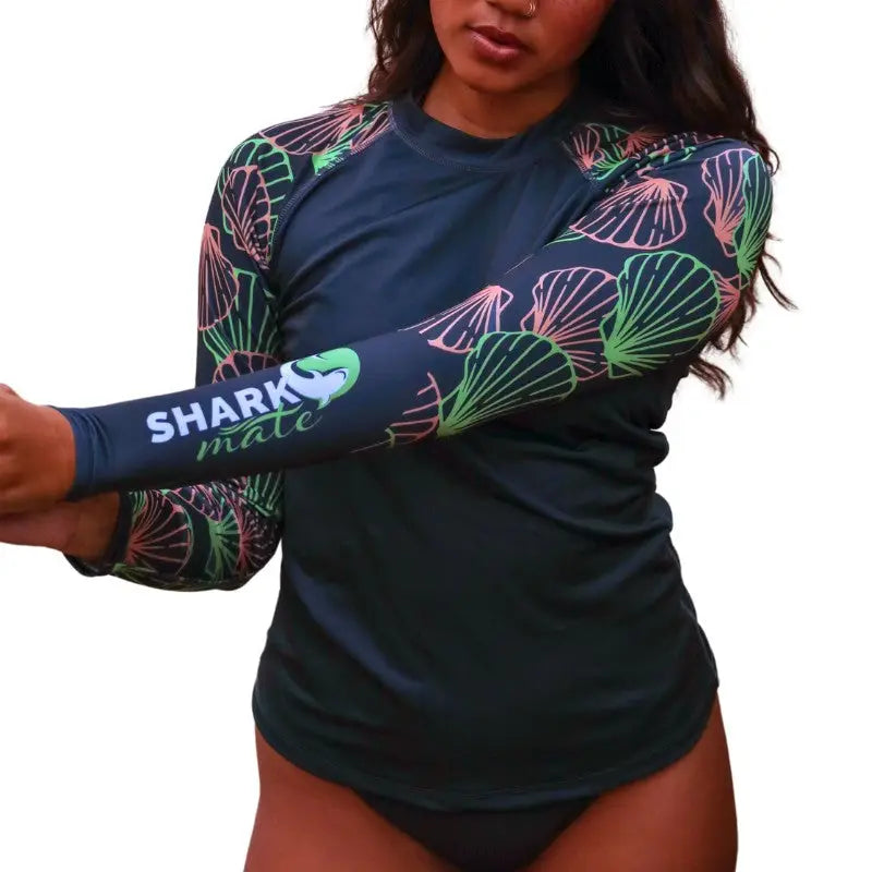 Shark Mate Women's Water Sports UV Rash Guard T-shirt with long sleeves, designed for beach and water activities.
