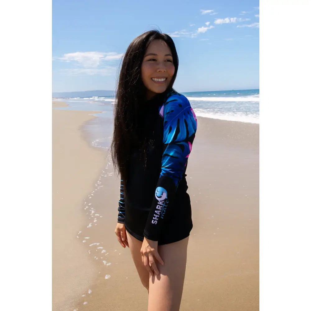 Shark Mate women's full sleeve UV rash guard T-shirt designed for water sports, featuring quick-dry fabric and sun protection.