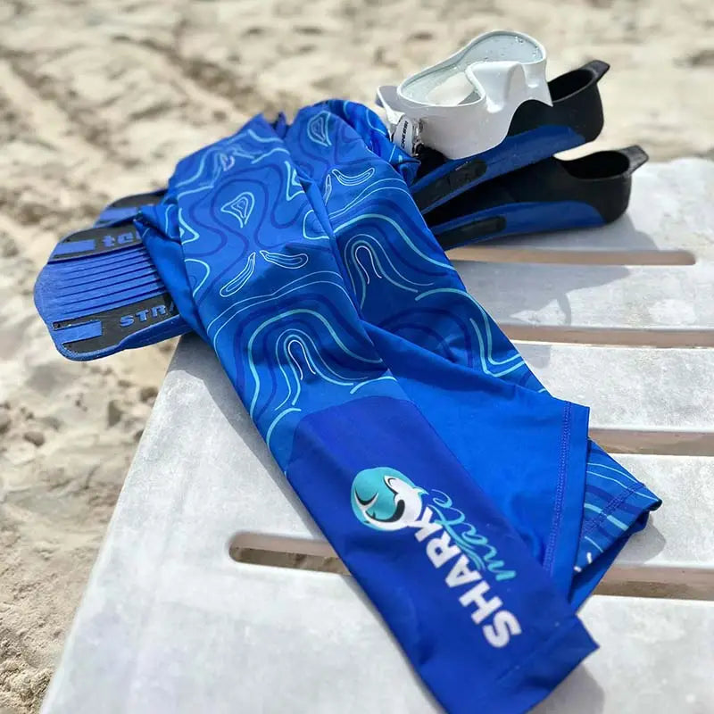 Shark Mate women's full sleeve UV rash guard T-shirt designed for water sports, featuring a lightweight, quick-dry fabric with brand logo.