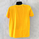Two SKiD O2 women's Breathe printed T-shirts in yellow, shown flat with front view and colorful design.