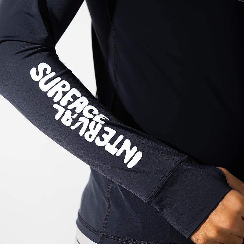 Surface Interval women's oceanic rash guard T-shirt with full sleeves, black color, designed for sun protection and water activities.