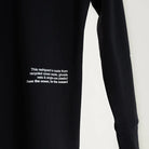Surface Interval Women's Oceanic human rash guard full sleeve T-shirt in black, designed for water activities and sun protection.