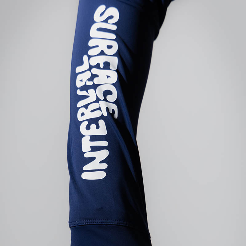 Surface Interval women's oceanic rash guard T-shirt with long sleeves in navy blue, designed for water sports and sun protection