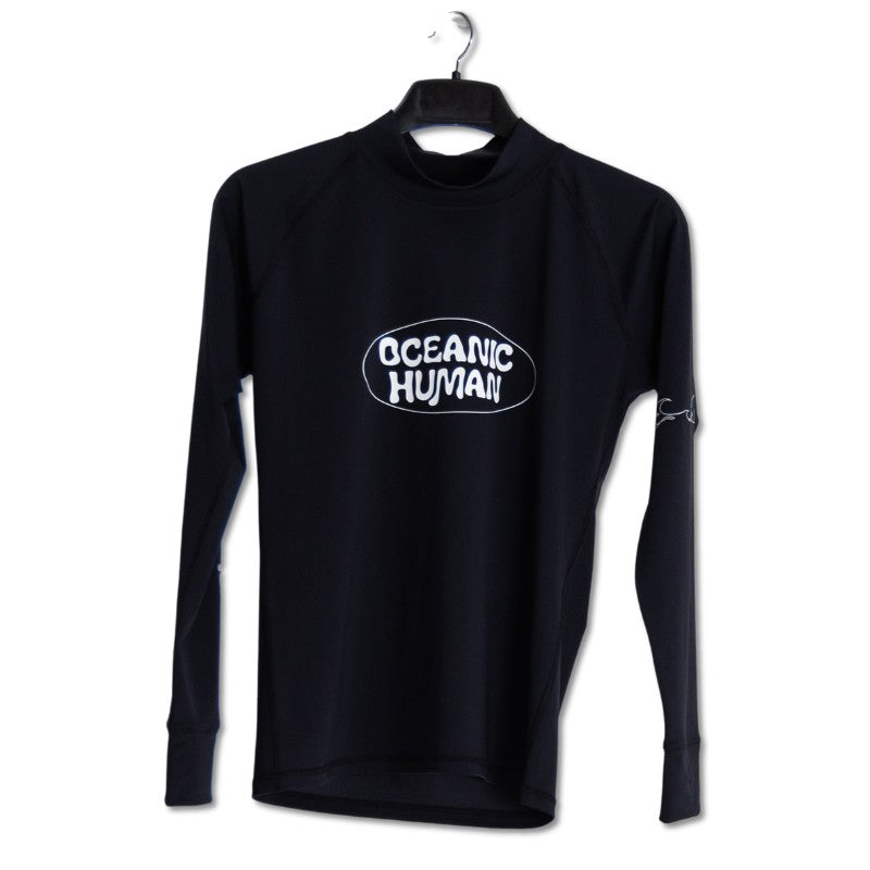 Surface Interval Women's Oceanic full sleeve rash guard T-shirt in black, designed for sun protection and active water sports.